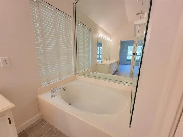 a bathroom with a bathtub