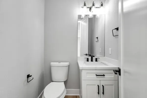 a spacious bathroom with a double vanity sink mirror and
