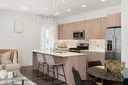 a kitchen with appliances and cabinets