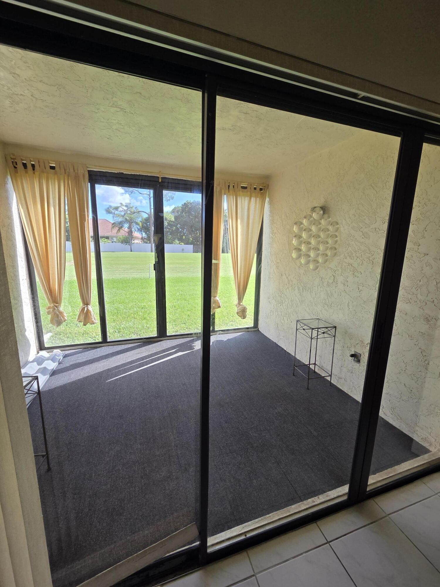 9187 Norte Lago, Unit 5E Boca Raton, FL 33428 - Photo 1 of 14 MO14