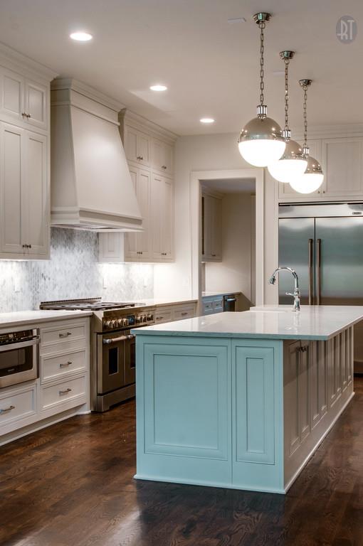 3500 Trimble Road Nashville, TN 37215 - Photo 24 of 28 a kitchen with stainless steel appliances granite countertop a sink a stove and a wooden floors