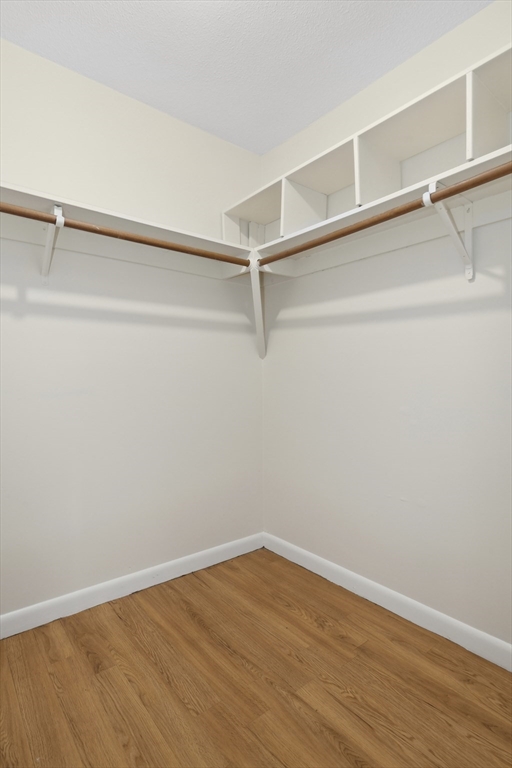 68 Main Street, Unit 17C Stoneham, MA 02180 - Photo 7 of 13 a view of an empty walk in closet