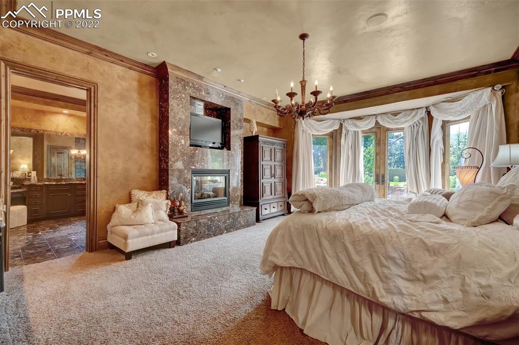 4 3rd Street Colorado Springs, CO 80906 - Photo 13 of 50 a bedroom with bed and large couches