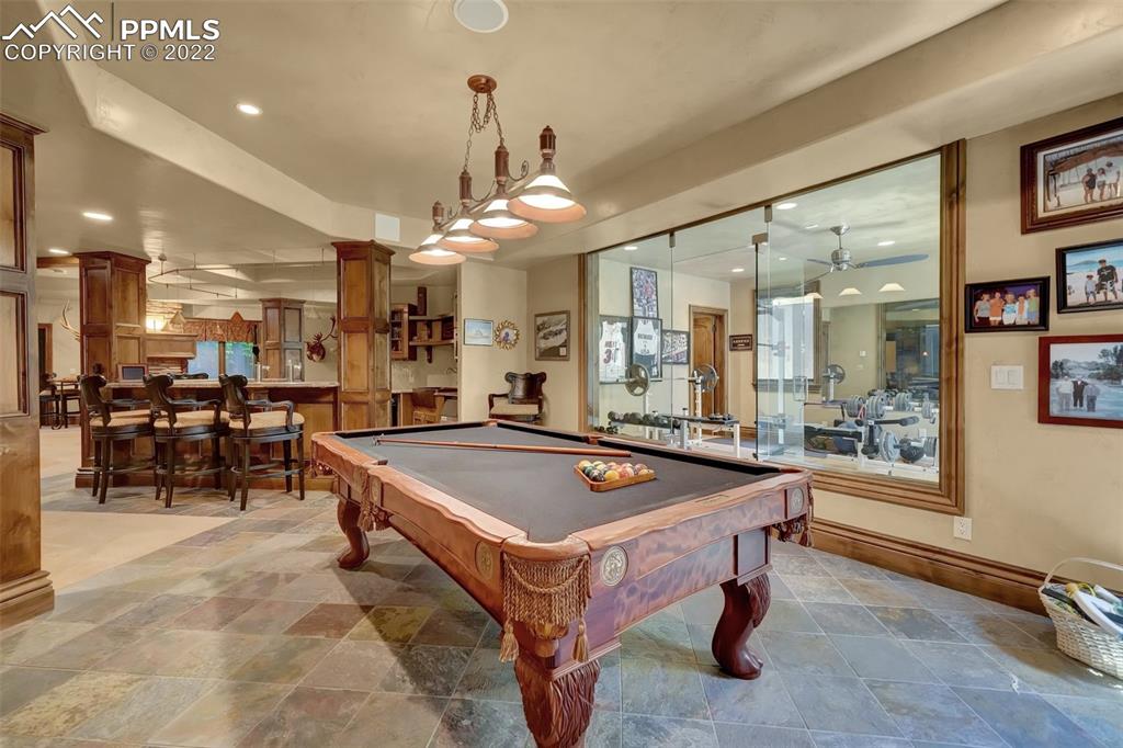 4 3rd Street Colorado Springs, CO 80906 - Photo 20 of 50 a room with pool table and windows