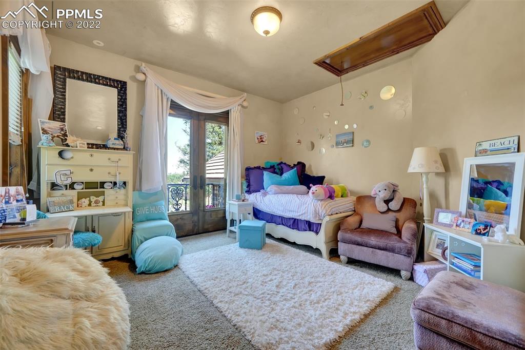 4 3rd Street Colorado Springs, CO 80906 - Photo 33 of 50 a living room with furniture and a large window