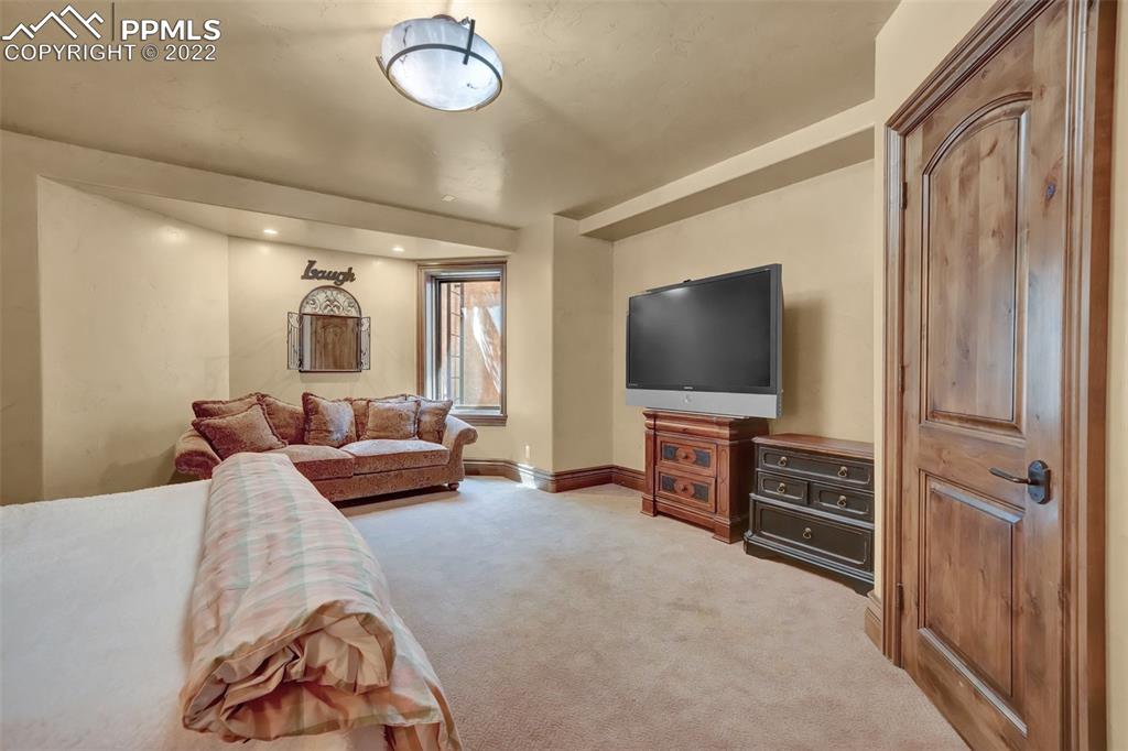 4 3rd Street Colorado Springs, CO 80906 - Photo 40 of 50 a living room with furniture and a flat screen tv