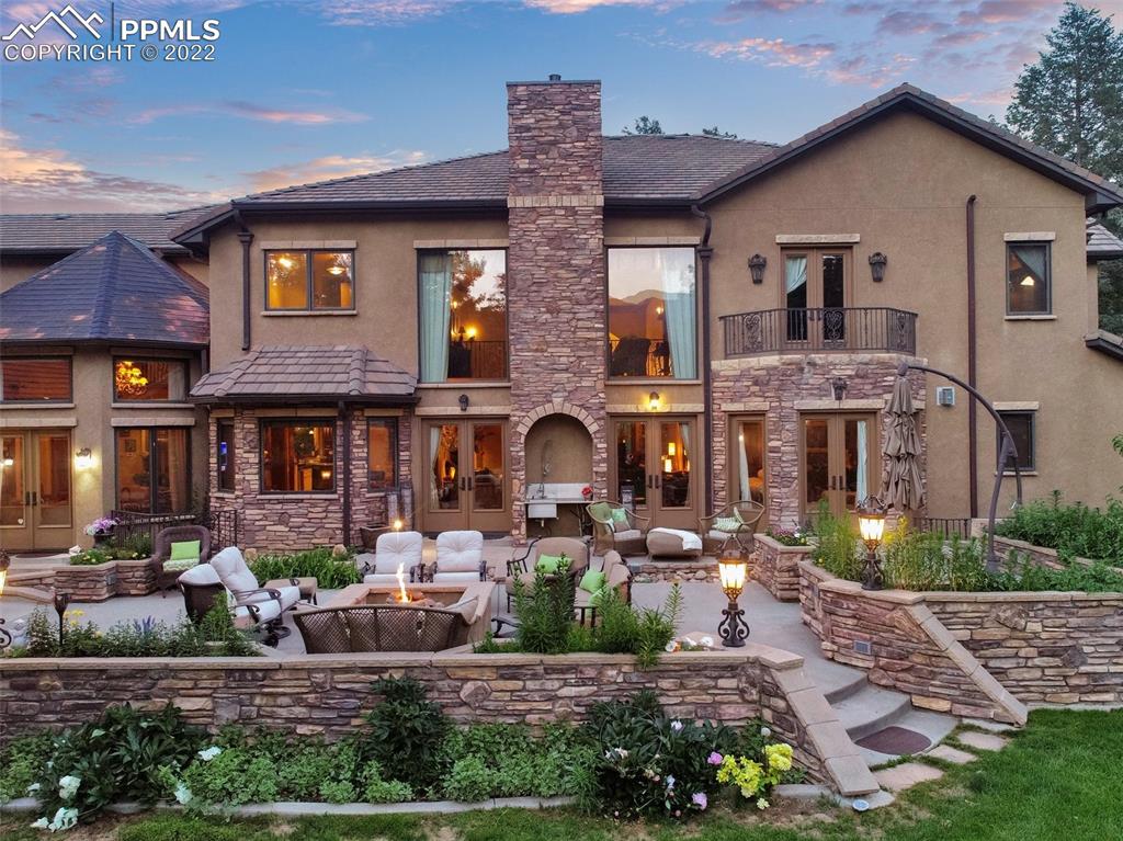 4 3rd Street Colorado Springs, CO 80906 - Photo 47 of 50 a front view of a house with garden