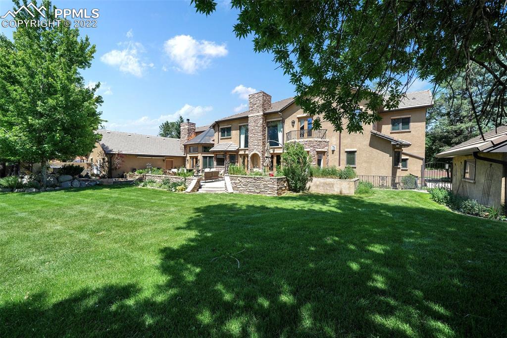 4 3rd Street Colorado Springs, CO 80906 - Photo 50 of 50 a view of an house with backyard space and sitting area