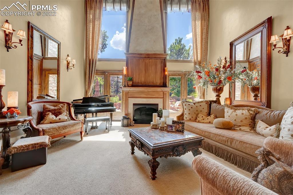 4 3rd Street Colorado Springs, CO 80906 - Photo 5 of 50 a living room with furniture fireplace and a large window