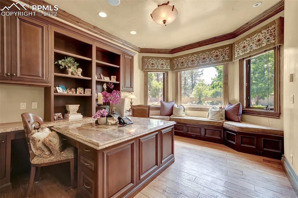 4 3rd Street Colorado Springs, CO 80906 - Photo 10 of 50 a view of a dining room with furniture window and wooden floor