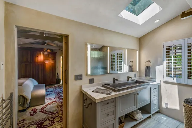 a kitchen with a sink stove and refrigerator