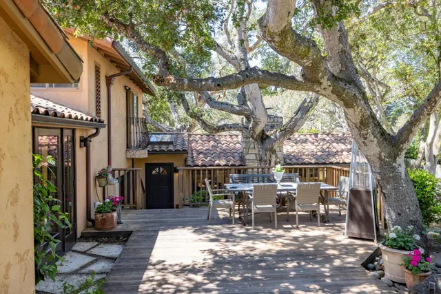 a view of a chairs and tables in the patio