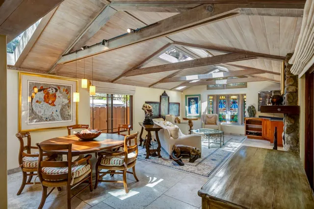 a view of a dining room with furniture window and outside view