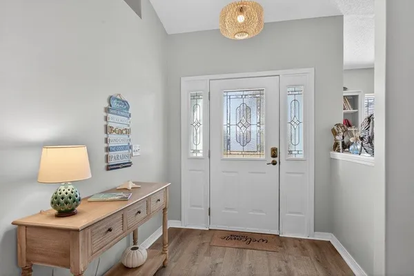 a picture of a room with a small yard and a large window