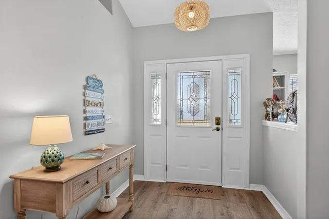 a living room with furniture fireplace and a flat screen tv