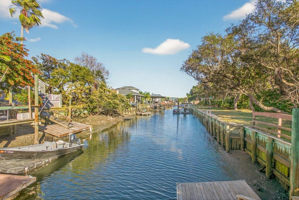 254 Basque Road St. Augustine, FL 32080 - Photo 3 of 67 a view of a ocean with boats and trees in the background