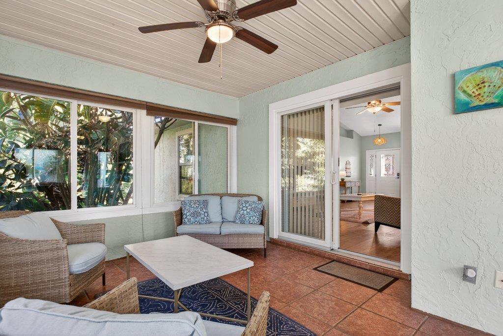 254 Basque Road St. Augustine, FL 32080 - Photo 40 of 67 a living room with furniture and a large window