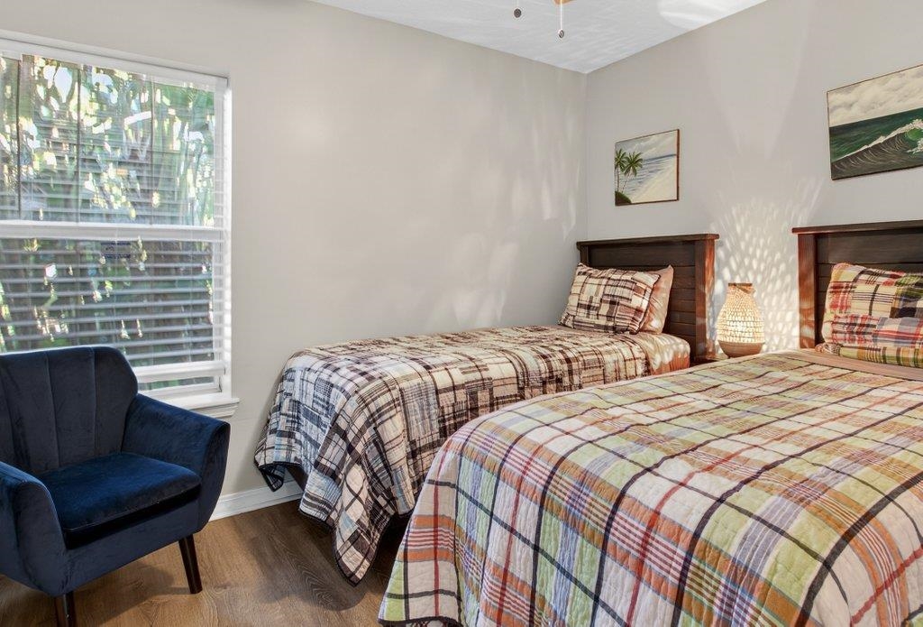 254 Basque Road St. Augustine, FL 32080 - Photo 41 of 67 a bedroom with two beds and a couch