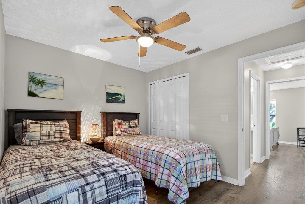 254 Basque Road St. Augustine, FL 32080 - Photo 42 of 67 a bedroom with a bed and window