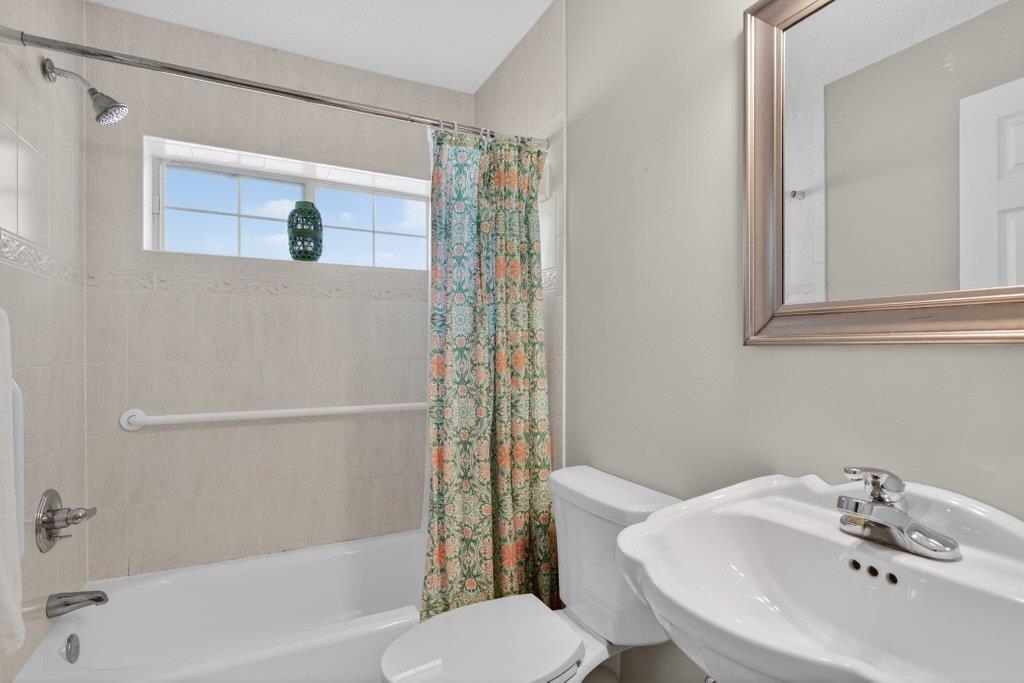 254 Basque Road St. Augustine, FL 32080 - Photo 43 of 67 a bathroom with a sink and a bathtub