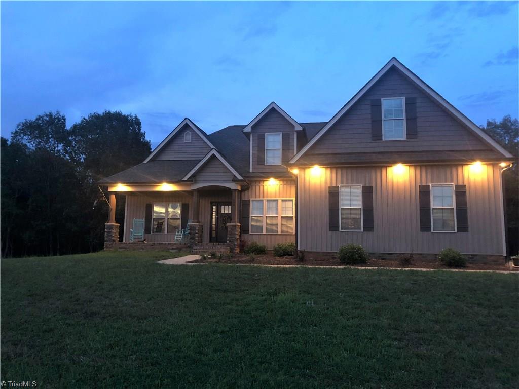 294 Mitchell Road Reidsville, NC 27320 - Photo 1 of 29 Pic taken after new roof and siding replacement was completed. Front lower level has been upgraded with a board & batten design...same color as the original siding.