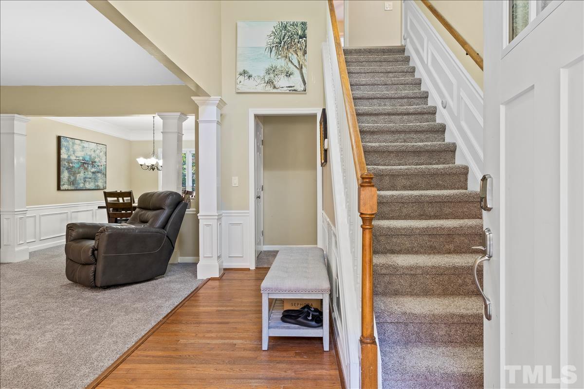 4737 Sinclair Drive Raleigh, NC 27616 - Photo 4 of 29 a living room with furniture and a entryway