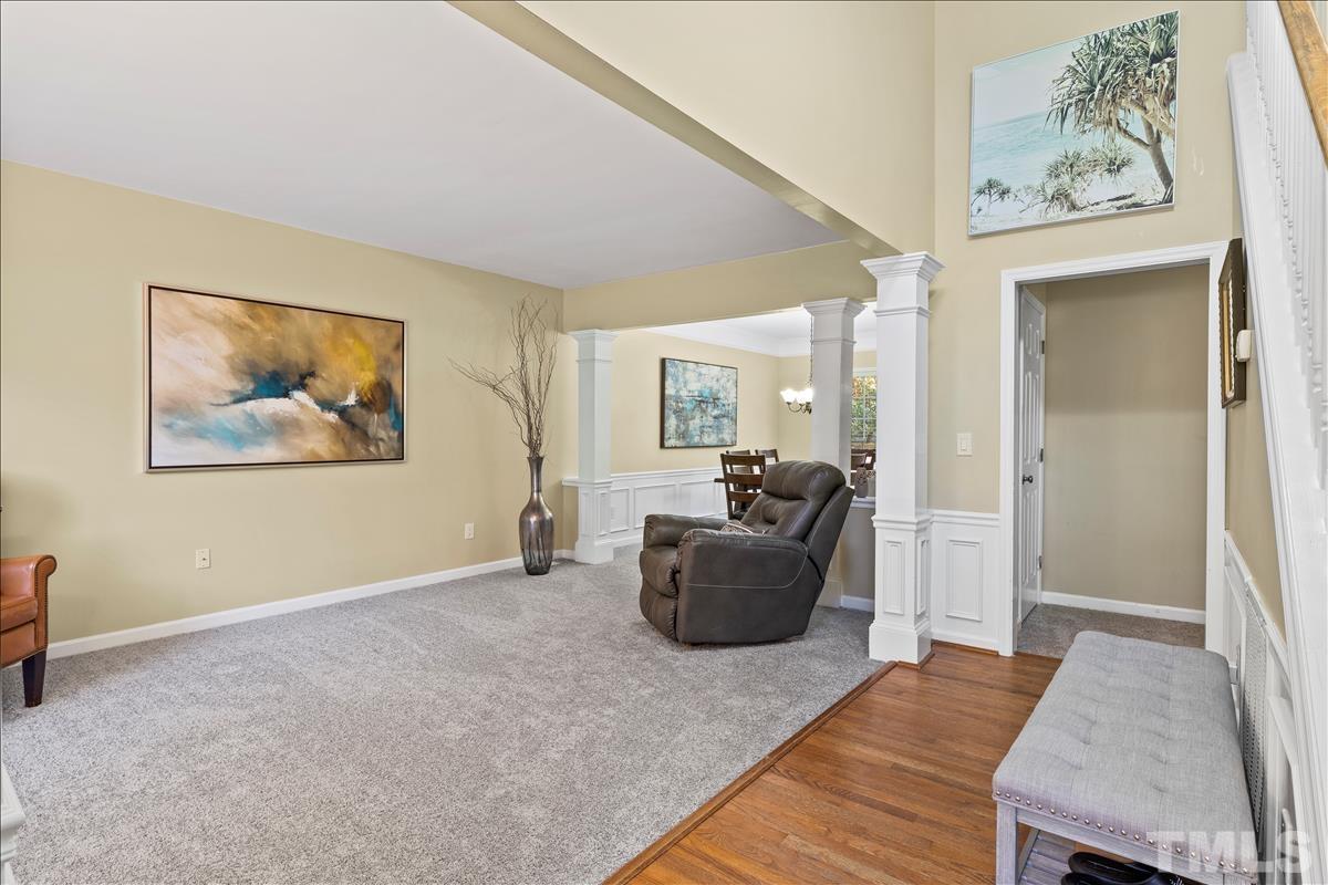 4737 Sinclair Drive Raleigh, NC 27616 - Photo 5 of 29 a living room with furniture and a potted plant