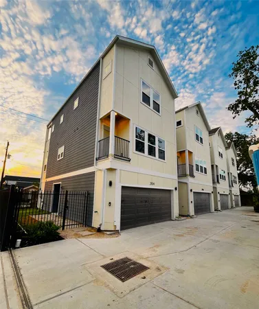 a front view of a house with parking