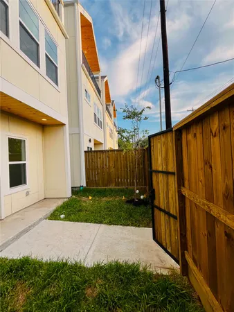 a view of a back yard of the house