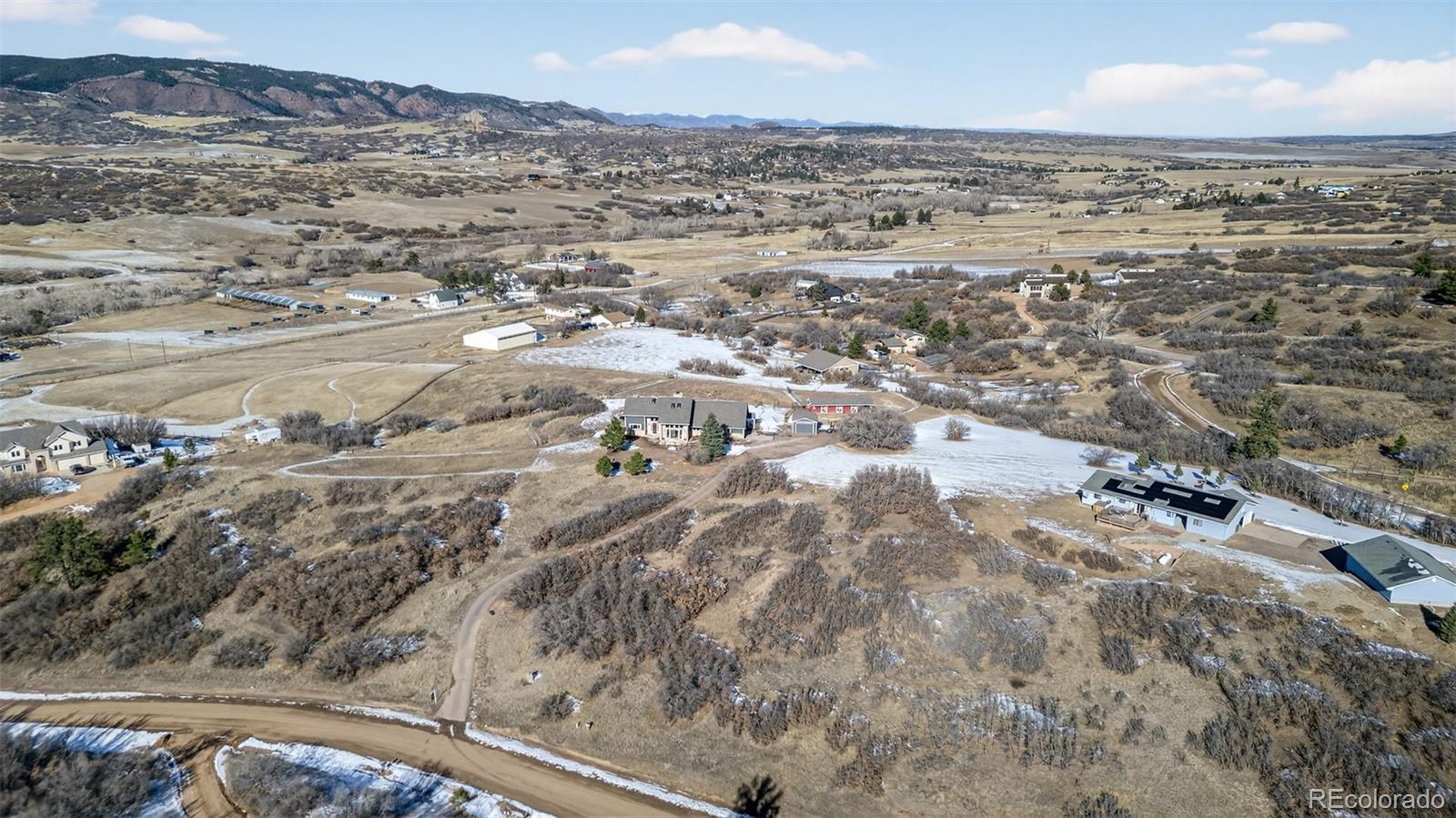 4205 West Parkridge Road Sedalia, CO 80135 - Photo 12 of 50 a view of city view and mountain view