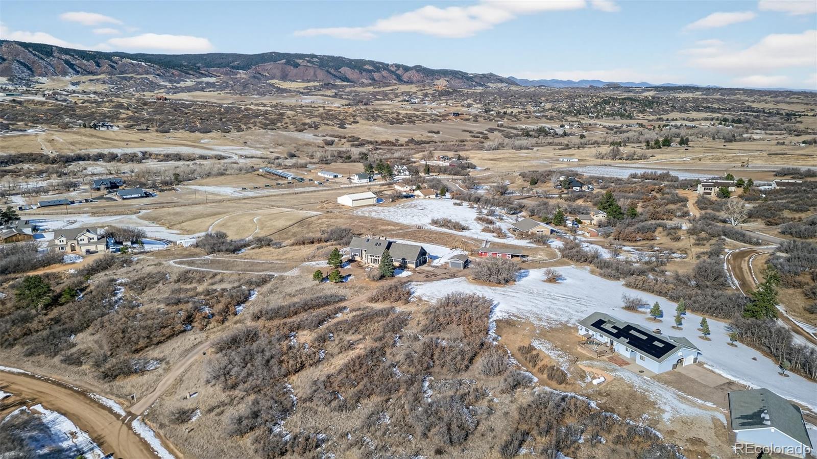 4205 West Parkridge Road Sedalia, CO 80135 - Photo 13 of 50 an aerial view of residential houses with outdoor space