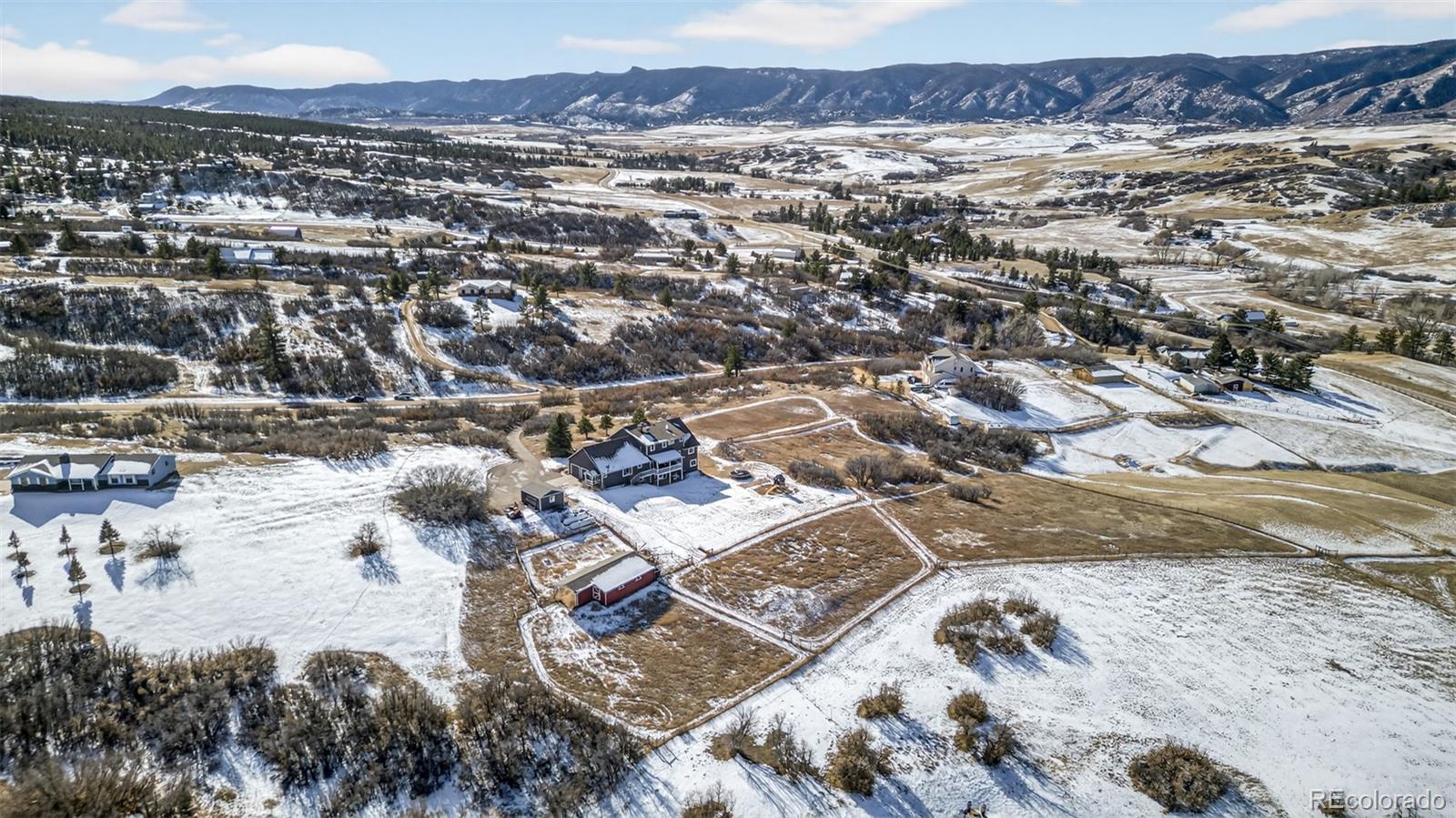 4205 West Parkridge Road Sedalia, CO 80135 - Photo 15 of 50 a view of city and mountain