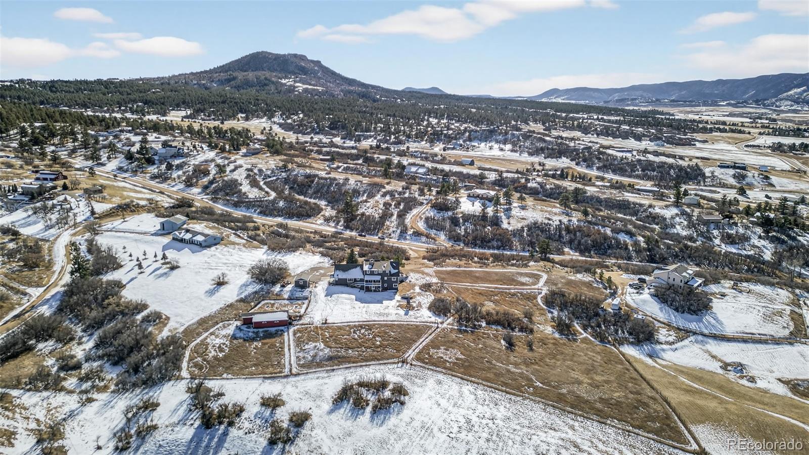 4205 West Parkridge Road Sedalia, CO 80135 - Photo 16 of 50 an aerial view of residential houses with city view