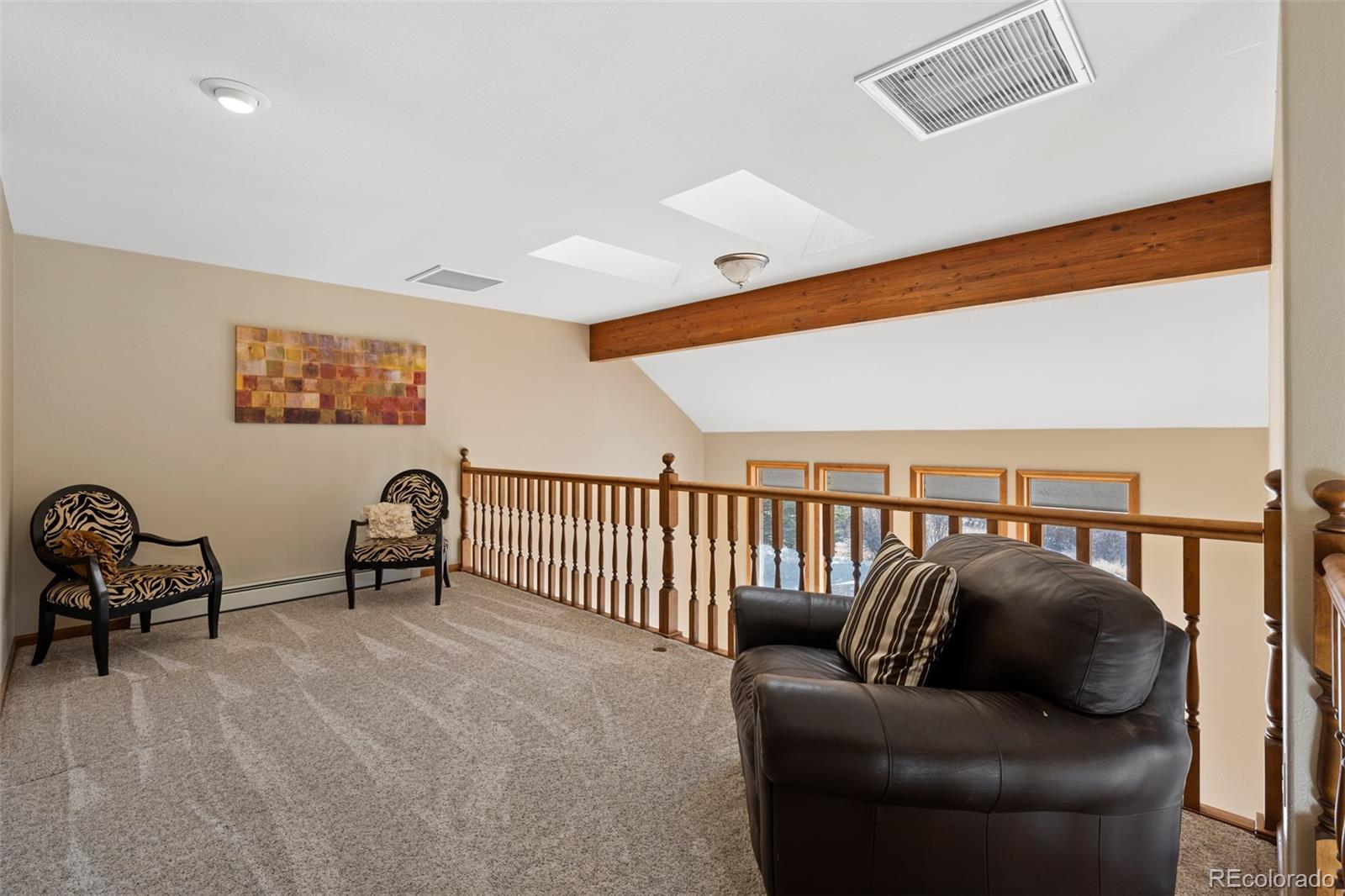 4205 West Parkridge Road Sedalia, CO 80135 - Photo 37 of 50 a living room with furniture