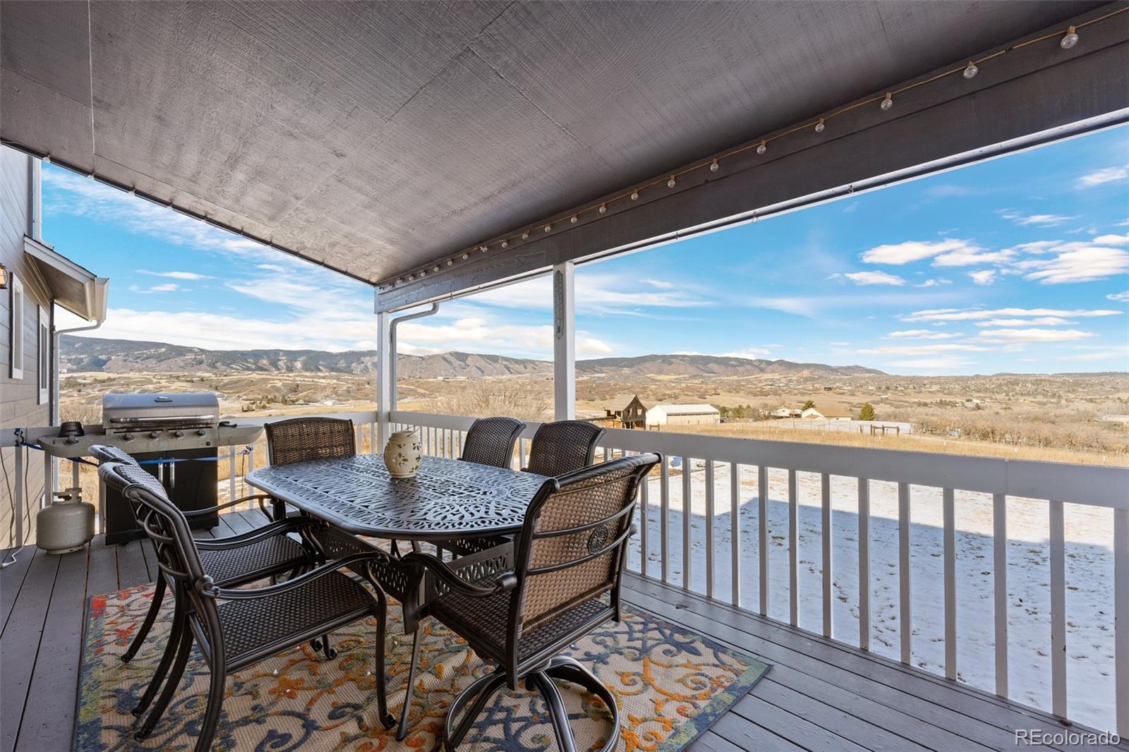 4205 West Parkridge Road Sedalia, CO 80135 - Photo 49 of 50 a view of a balcony with furniture
