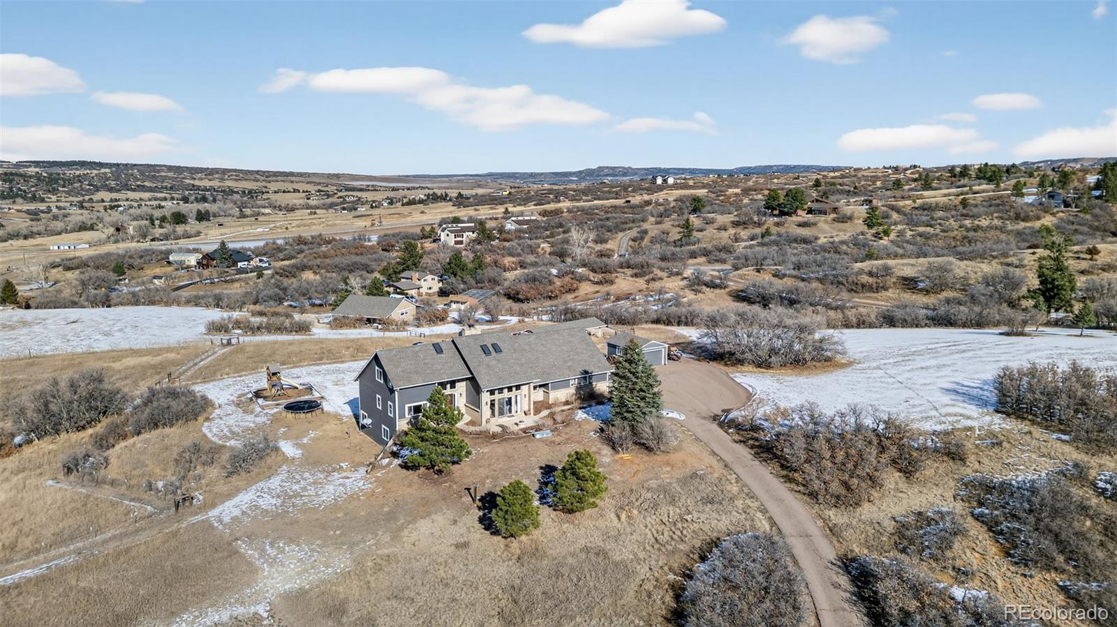 4205 West Parkridge Road Sedalia, CO 80135 - Photo 10 of 50 an aerial view of a city