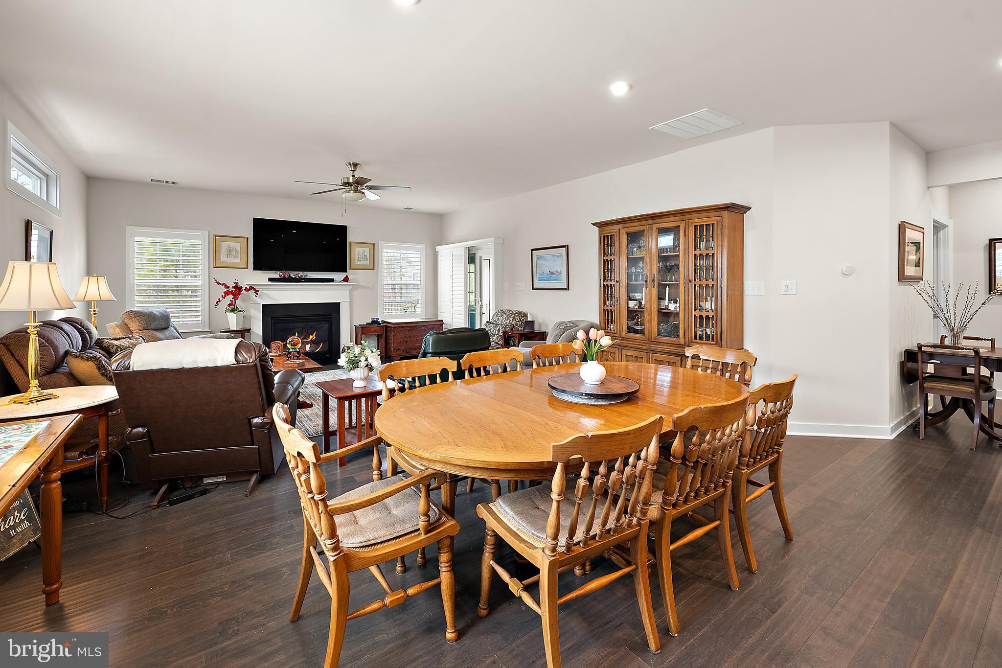8 Old Forge Drive Ocean View, DE 19970 - Photo 27 of 103 a view of a dining room with furniture window and wooden floor