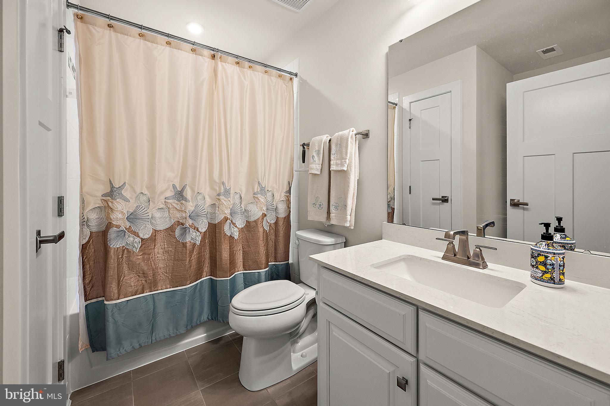 8 Old Forge Drive Ocean View, DE 19970 - Photo 46 of 103 a bathroom with a sink a toilet and shower
