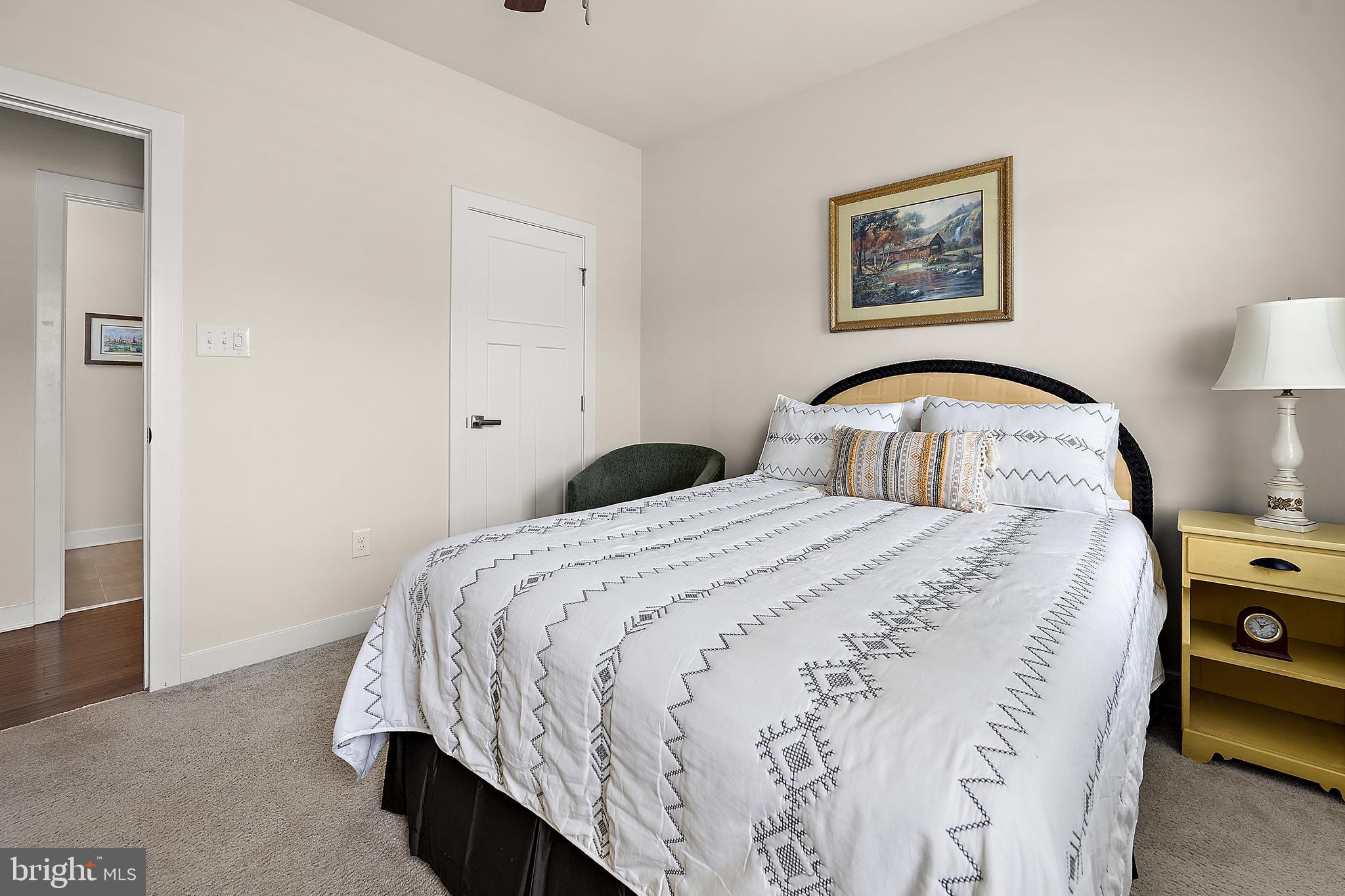 8 Old Forge Drive Ocean View, DE 19970 - Photo 50 of 103 a bedroom with a bed and a night stand