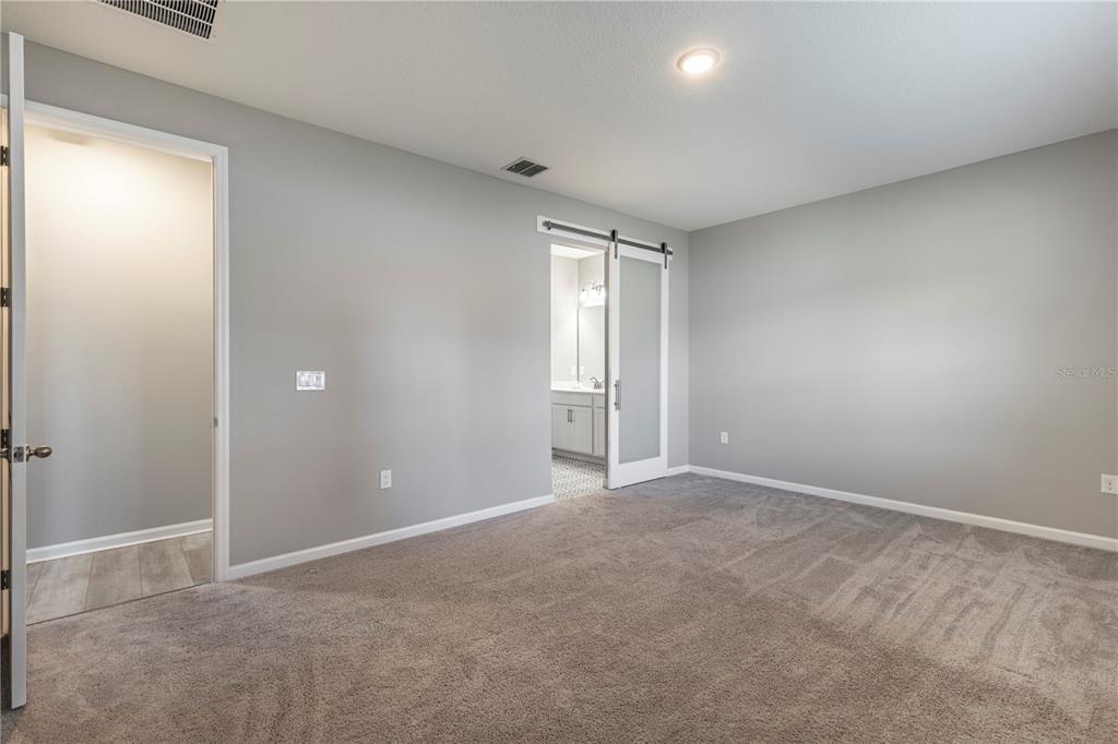 10361 Church Hammock Road Leesburg, FL 34788 - Photo 19 of 46 a view of an empty room