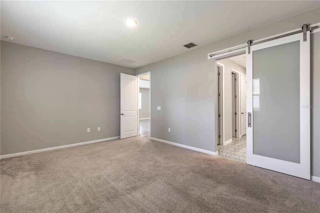 10361 Church Hammock Road Leesburg, FL 34788 - Photo 21 of 46 a view of an empty room