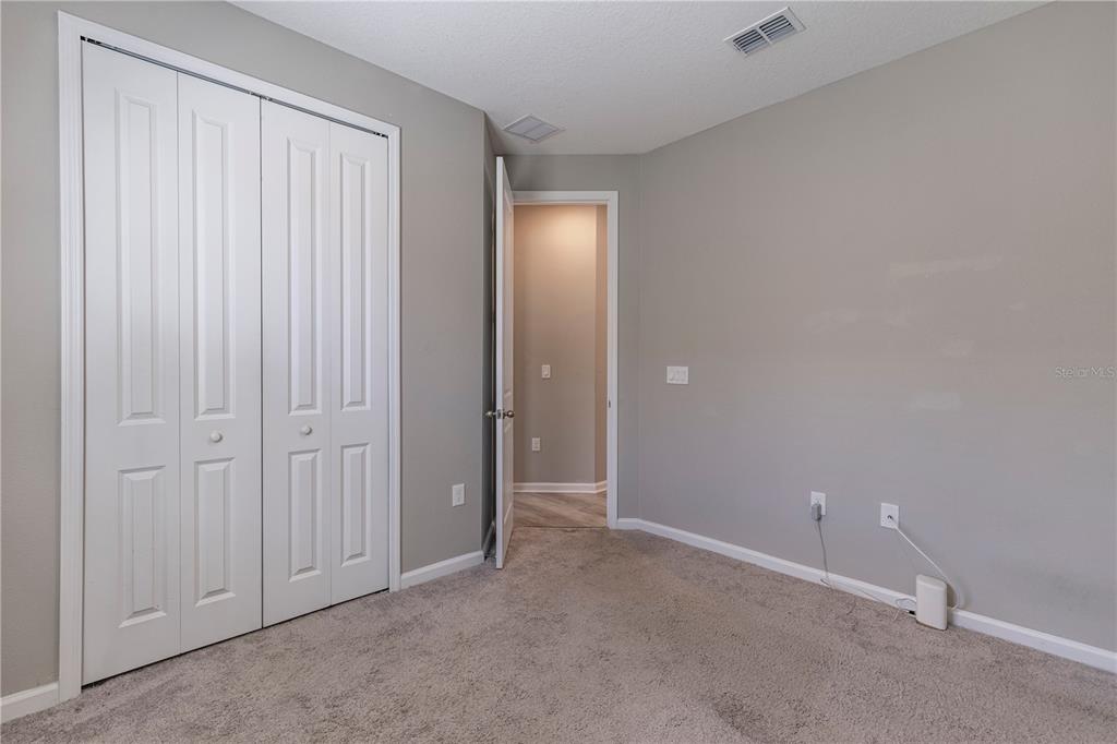 10361 Church Hammock Road Leesburg, FL 34788 - Photo 31 of 46 an empty room with closet area