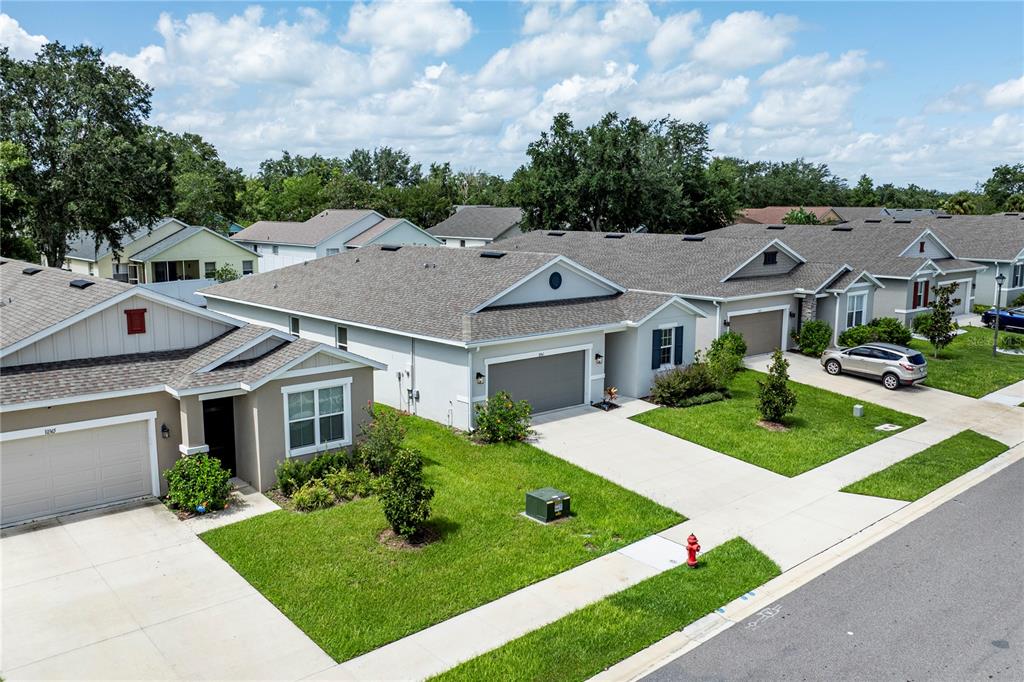 10361 Church Hammock Road Leesburg, FL 34788 - Photo 40 of 46 a aerial view of a house with a yard