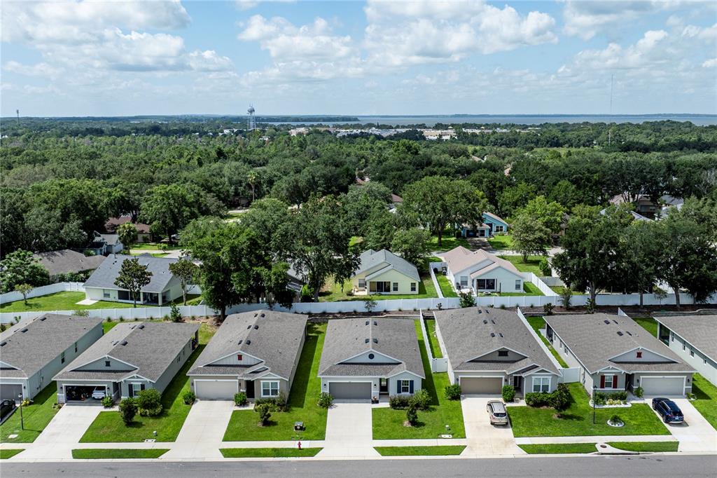 10361 Church Hammock Road Leesburg, FL 34788 - Photo 43 of 46 an aerial view of houses with yard