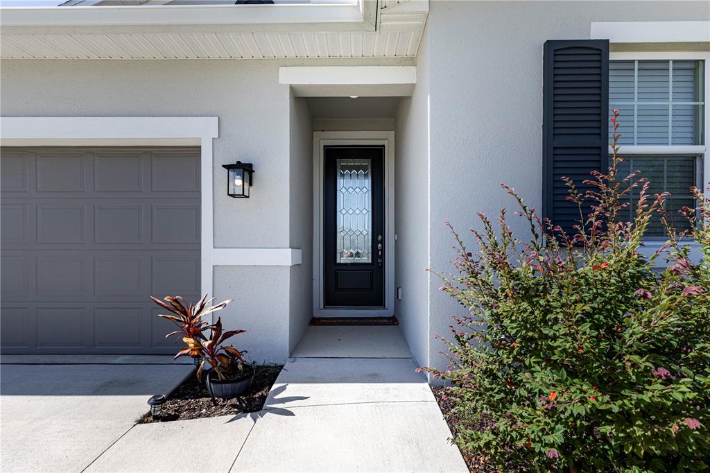 10361 Church Hammock Road Leesburg, FL 34788 - Photo 8 of 46 a view of a entryway door of the house