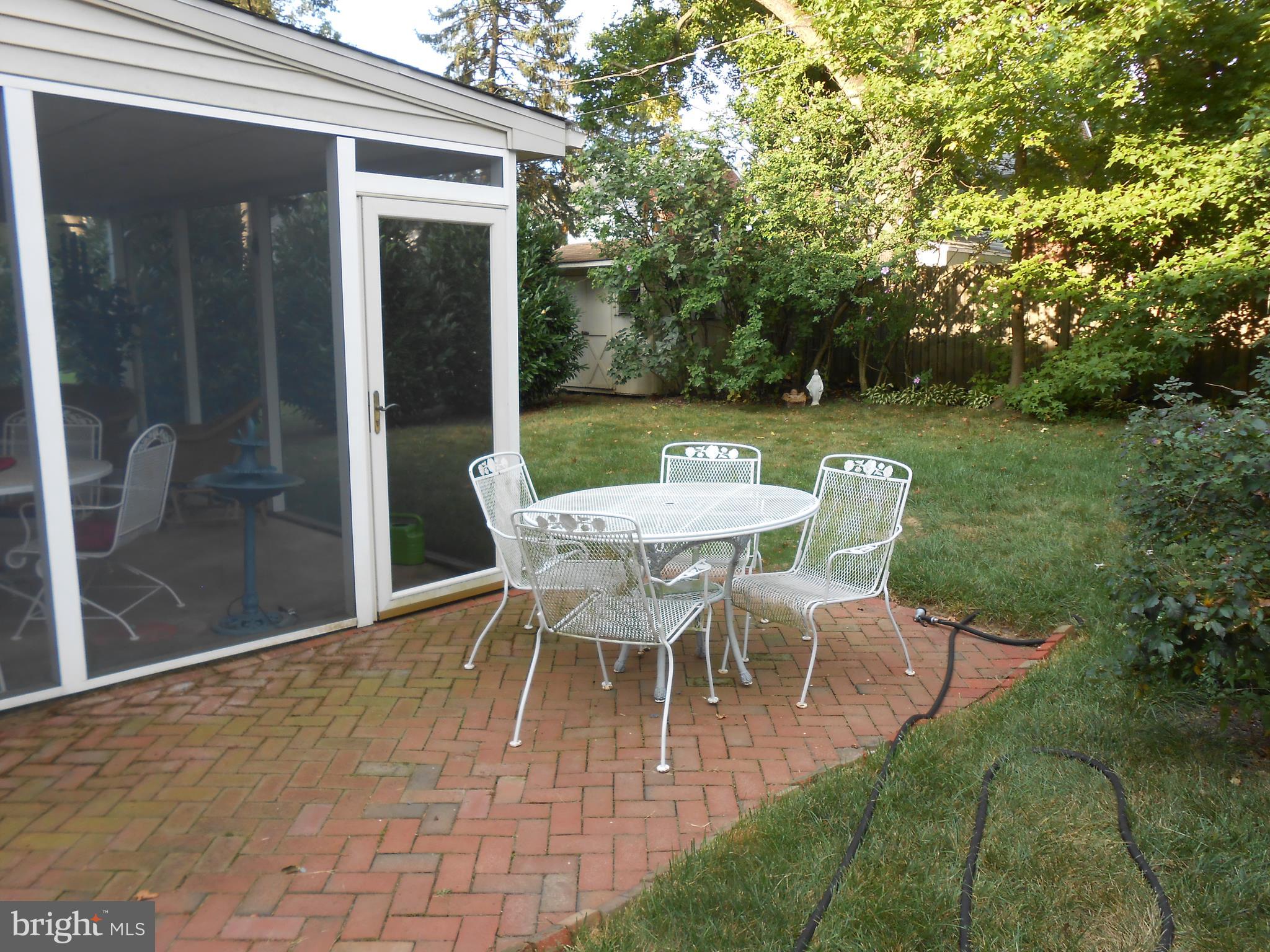 7 York Road Wilmington, DE 19803 - Photo 34 of 34 Back Brick Patio of Screen Porch