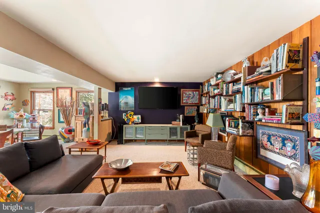 a view of a dining room with furniture and window