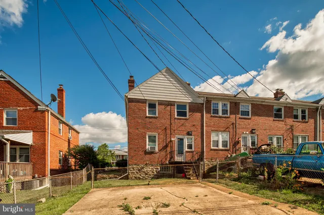 a view of a house with swimming pool