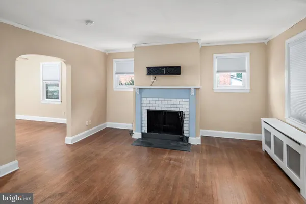 a picture of a wall with white wall and a painting
