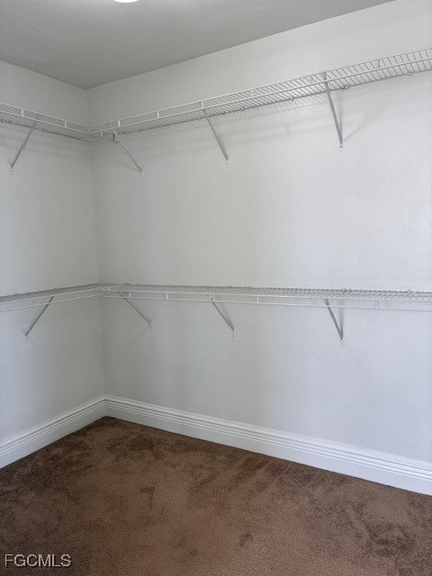 2310 First Street, Unit 703 Fort Myers, FL 33901 - Photo 18 of 28 a view of a room with racks on the wall